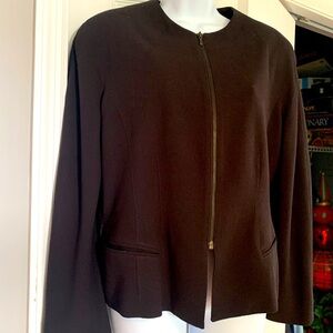 Vintage Emanuel brown zipper vintage blazer. Pre-owned in good shape. Size 44-10